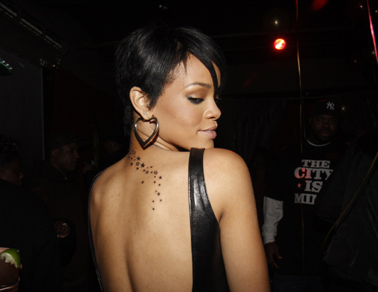  an example picture of Rihanna's tattoo. star tattoo in her . stars .